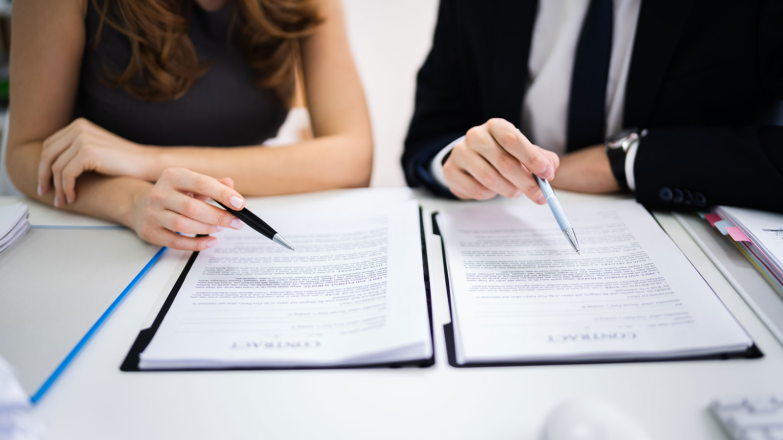 Coworkers reviewing documents
