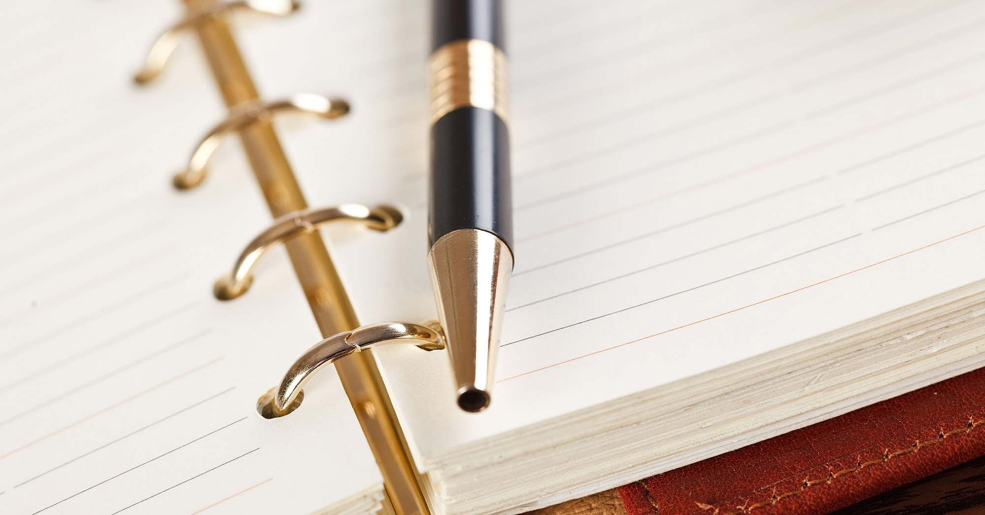 Pen on Open Notebook