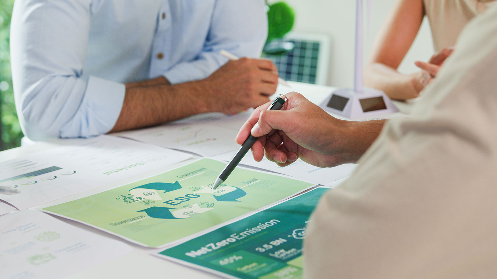 Closeup group businesspeople talk ESG strategies risk management workshop,
