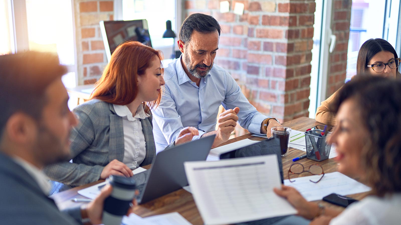 Group of business workers working together
