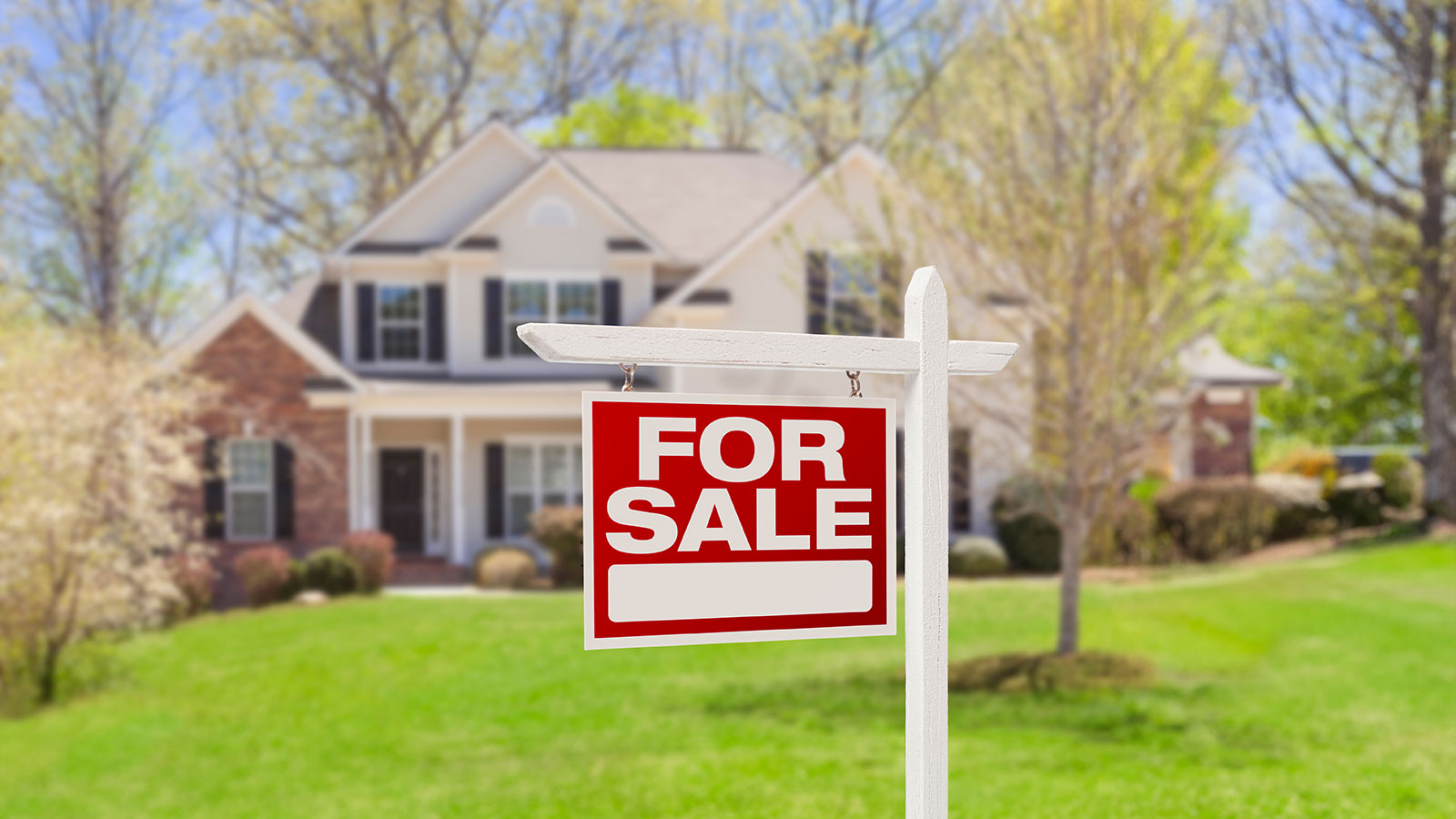 Home For Sale Real Estate Sign and House