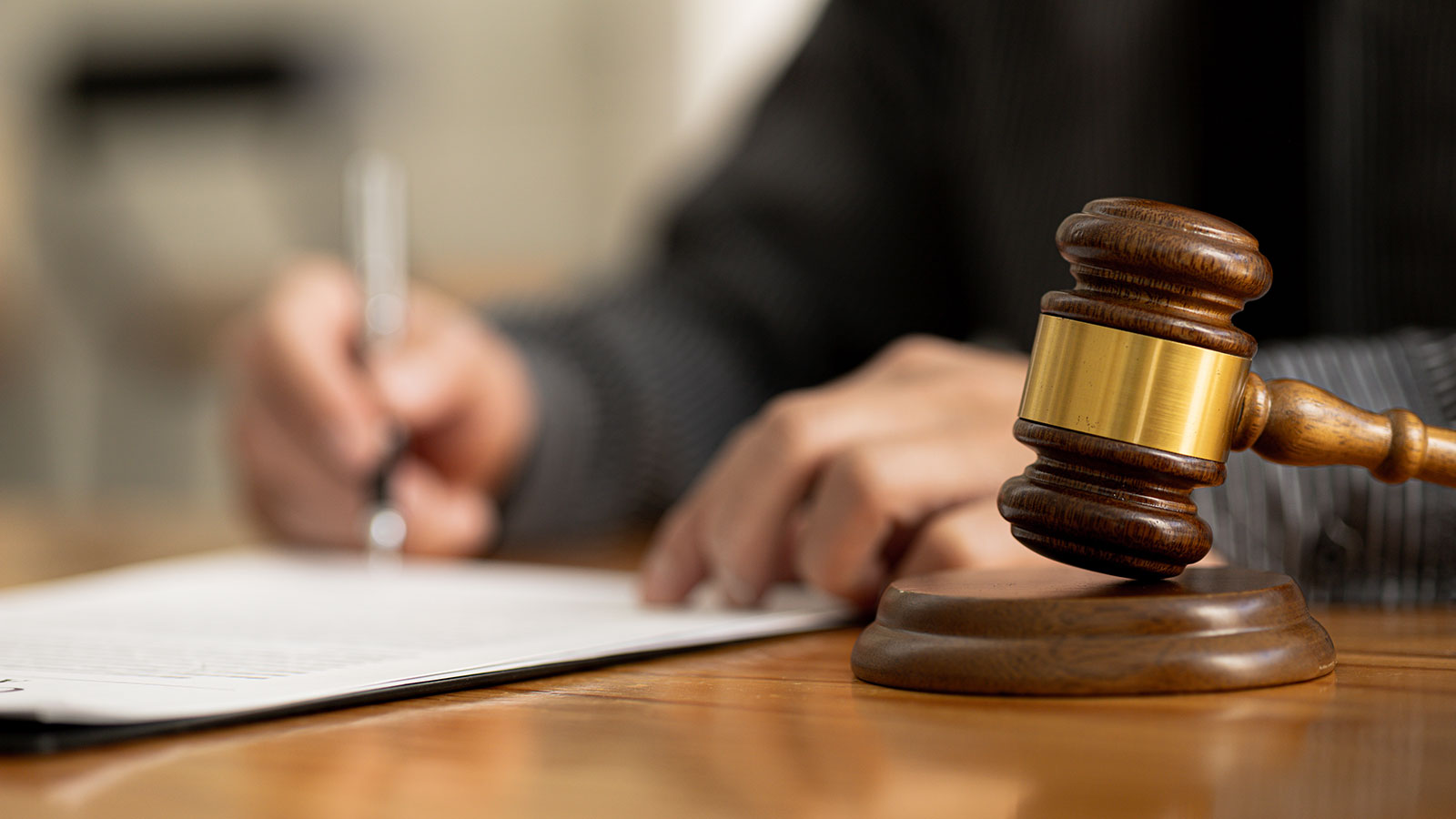 The judge's hammer is placed on the table