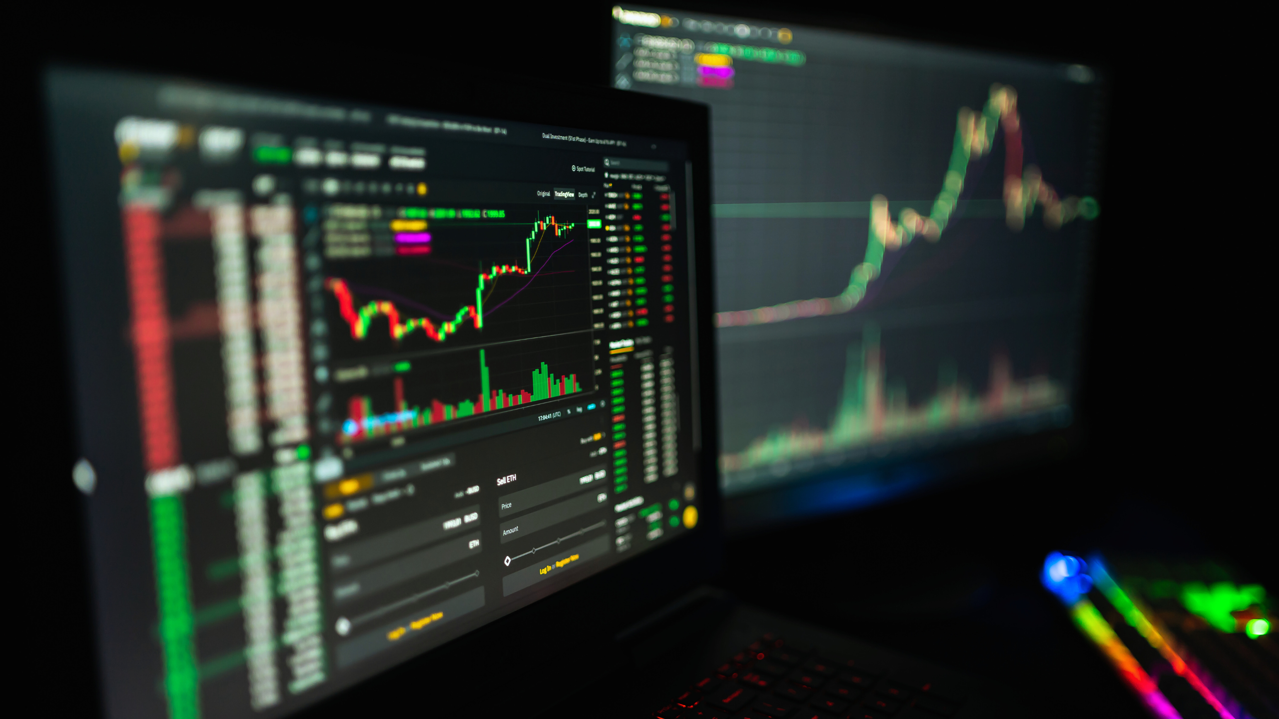 Computer with cryptocurrency graphs.